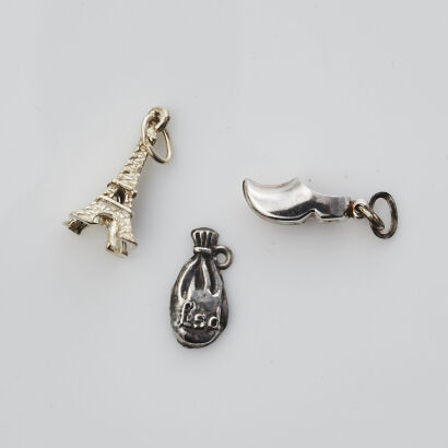 Three Assorted Silver Charms