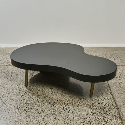 A Black Biomorphic Coffee Table with Gold Base