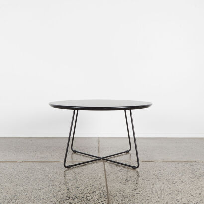 A Round Mid-Century Atomic Style Coffee Table In Black