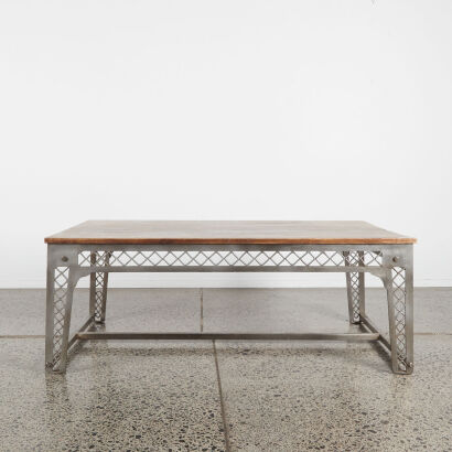 An Industrial Coffee Table With Wood Top & Steel Base