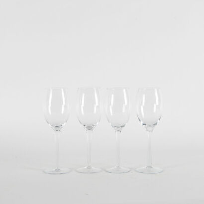 A Set Of Four Crystal Wine Glasses