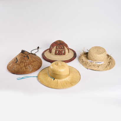 A Collection of Four Straw Hats