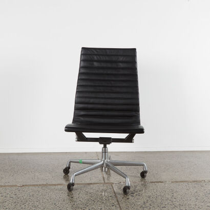 An Eames High-Back Group Chair