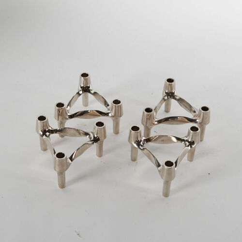 A Set Of Four Nagel Mid-Century Stacking Silver Chrome Candle Holders