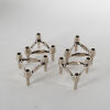 A Set Of Four Nagel Mid-Century Stacking Silver Chrome Candle Holders