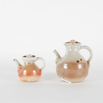 A Pair of Andrew van der Putten Teapots