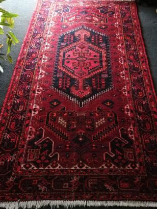 A Hand Knotted Wool Persian Rug