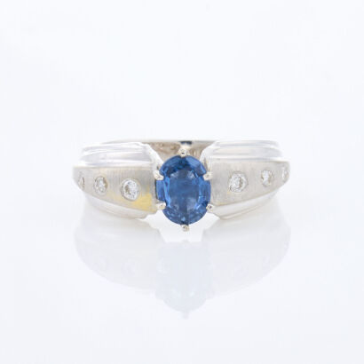 18ct White Gold, .90ct Sapphire and .15ct Diamond Ring.