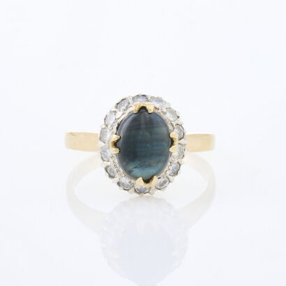 14ct Yellow Gold, .60ct Sapphire and .50ct Diamond Ring.