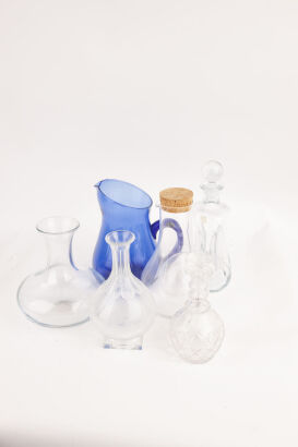 Six decanters and jug in one lot