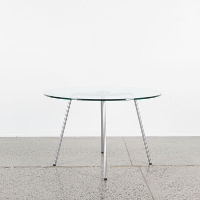 A Modern Designer Glass Top Coffee Table With Metal Legs