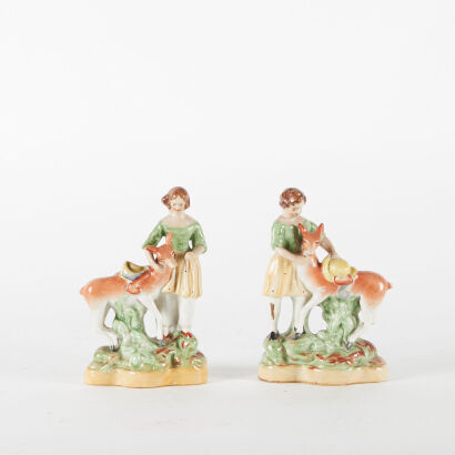 A Pair Of Porcelain Figures