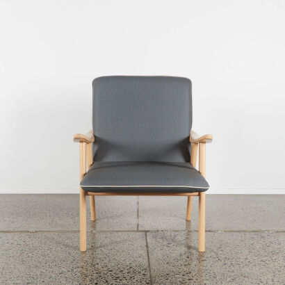 A Contemporary Armchair in Charcoal Upholstery