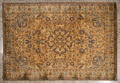 A Persian Rug With Floral Motif