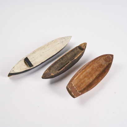 A Trio Of Carved Boats