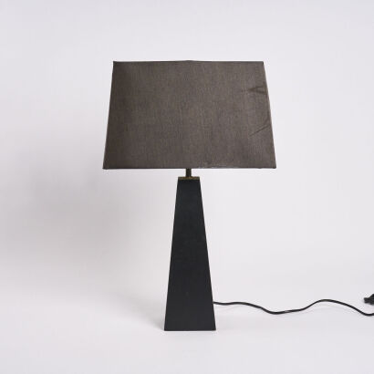 A Contemporary Table Lamp With Wooden Base