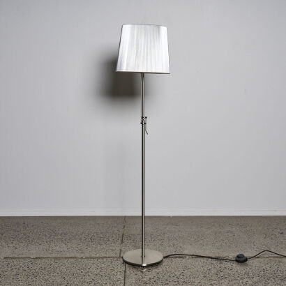 An Anglepoise Floor Lamp With Silver Shade