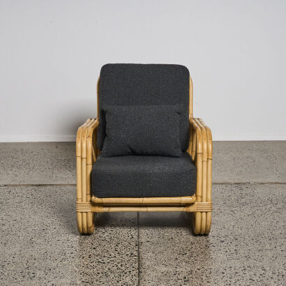 A Mid-Century Chunky Pretzel Cane Armchair With Boucle Upholstery And Cushion