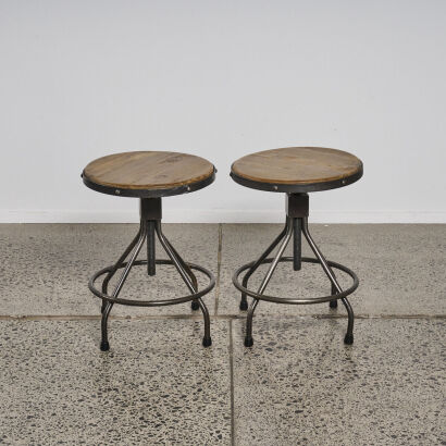 A Set Of Two Industrial Stools