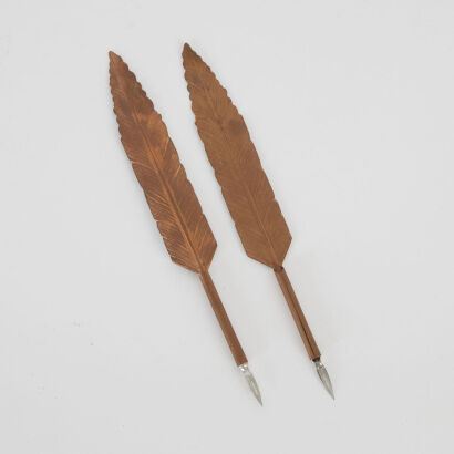 A Pair Of French Copper Feather Quills