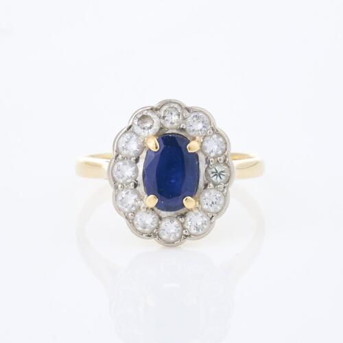 18ct White Gold, 1.35ct Sapphire and .48ct Diamond Ring