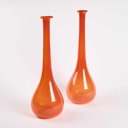 A Pair Of Tangerine Art Glass Bottles