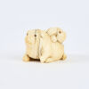 A Well Carved 19th Century Ivory Netsuke Depicting Two Puppies Playing Together, c1830 - 3