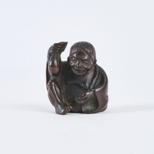 A Late Meiji Period Carved Wooden Shojo Netsuke, c1880