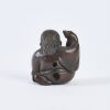 A Late Meiji Period Carved Wooden Shojo Netsuke, c1880 - 2