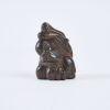 A Late Meiji Period Carved Hardwood Netsuke Of Chokwaro, c1895
