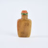 A Brown Hard Stone Snuff Bottle Coral Stopper, c1900 - 2