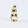 A Meiji Period Ivory Skull With Toads Okimono / Netsuke
