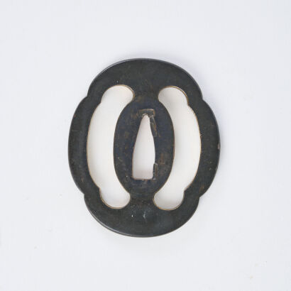 A Meiji Period Four Lobed Bronze Patina Wakizashi Tsuba