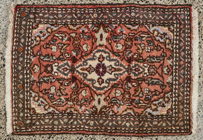 A Hand Knotted Persian Rug