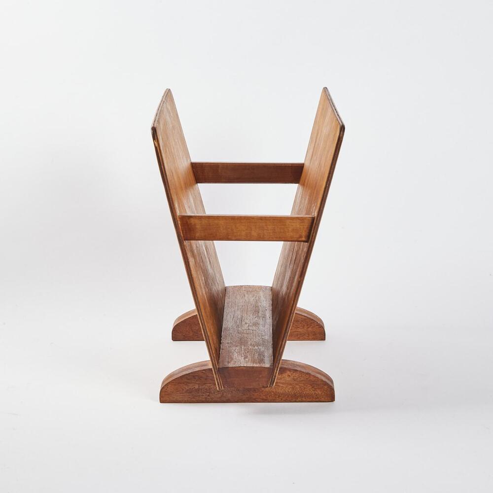 A Mid Century Bent Ply Magazine Rack