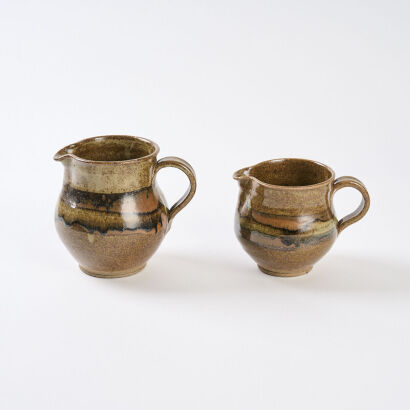 A Pair of Paul Melser Jugs