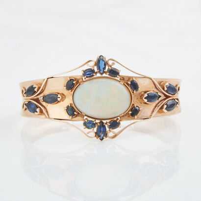 14ct Rose Gold, 17.00ct Opal and 8.20ct Sapphire Bangle