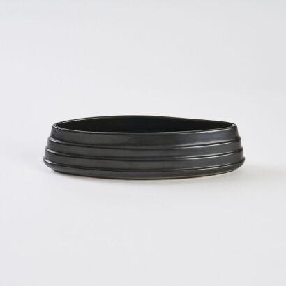 A Rare Black Glazed Crown Lynn Trough
