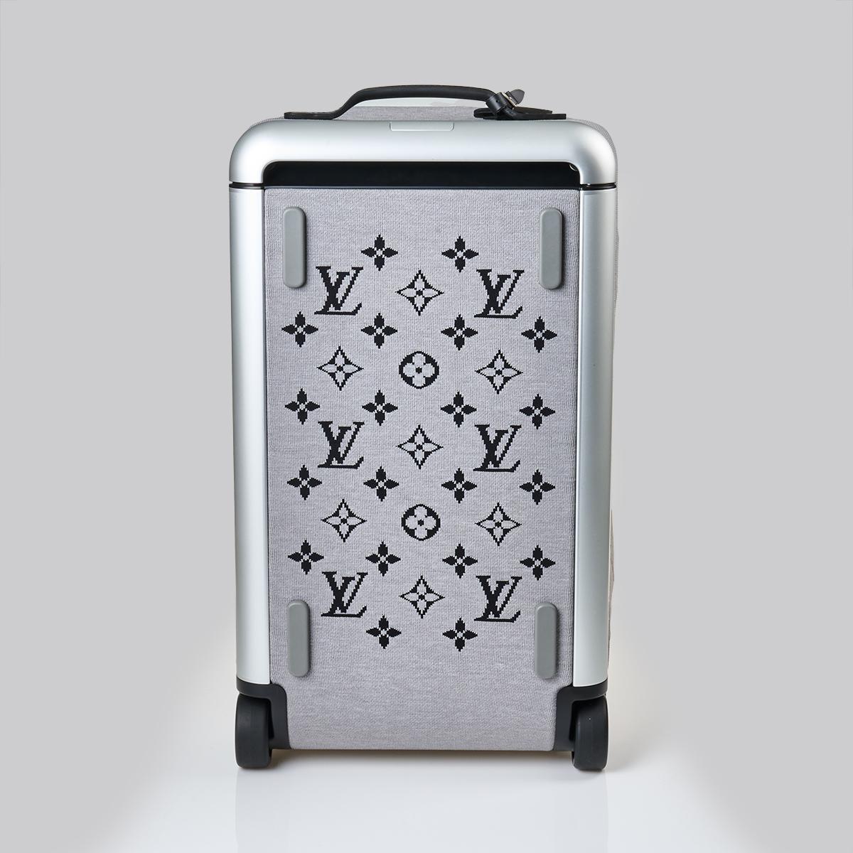At Auction: Louis Vuitton, Louis Vuitton Jacquard Monogram Rolling Suit Case