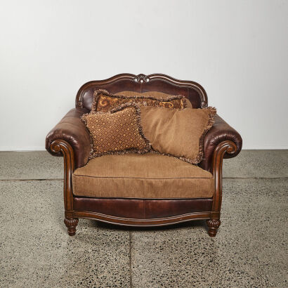 A Large Vintage Library Chair In Brown Leather Upholstery