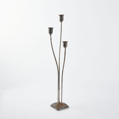 A Solid Steel Three Piece Candle Holder