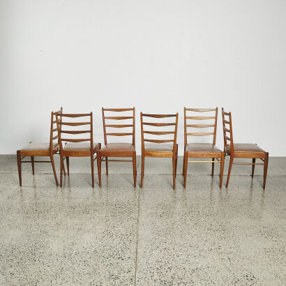 A Suite Of Six Backhouse Ladderback Dining Chairs