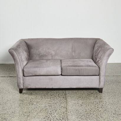 A Modern Two Seater Couch in Grey Fabric