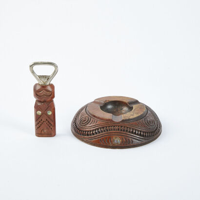 A Carved Maori Bottle Opener And Ashtray With Paua Accent