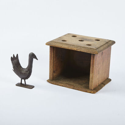 An Antique Rustic Box And Handmade Metal Chicken