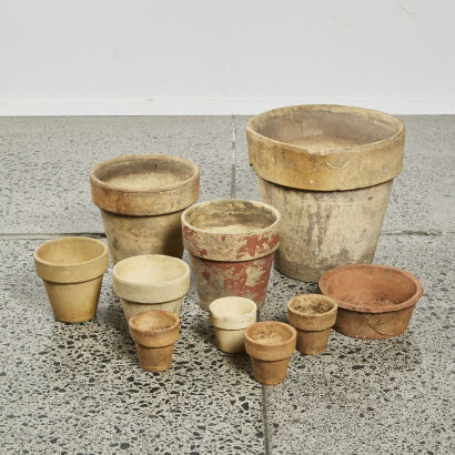 A Collection Of Ten Vintage Clay Pots