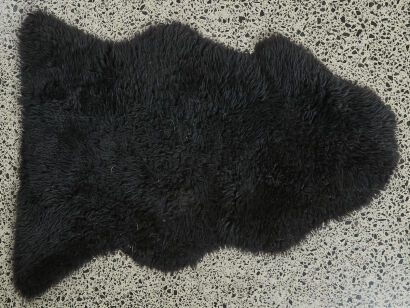 A Black Sheepskin From New Zealand