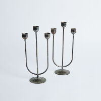 A Pair Of Sliver Plated Italian Candlesticks