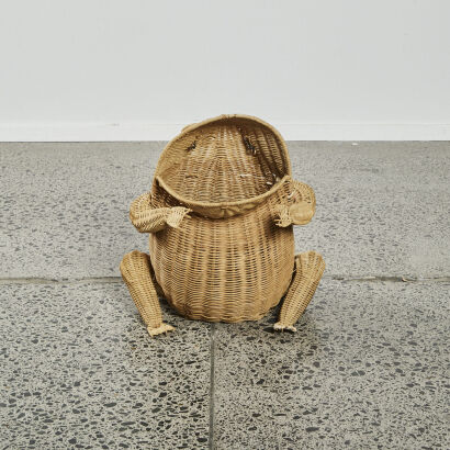 A Mid-Century Rattan Frog Magazine Holder