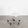 A Modern White Plastic Form Desk Chair On Castors - 2